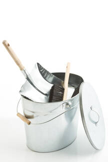 Close Up Of Zinc Ash Bucket With Brush And Shovel Stockphoto