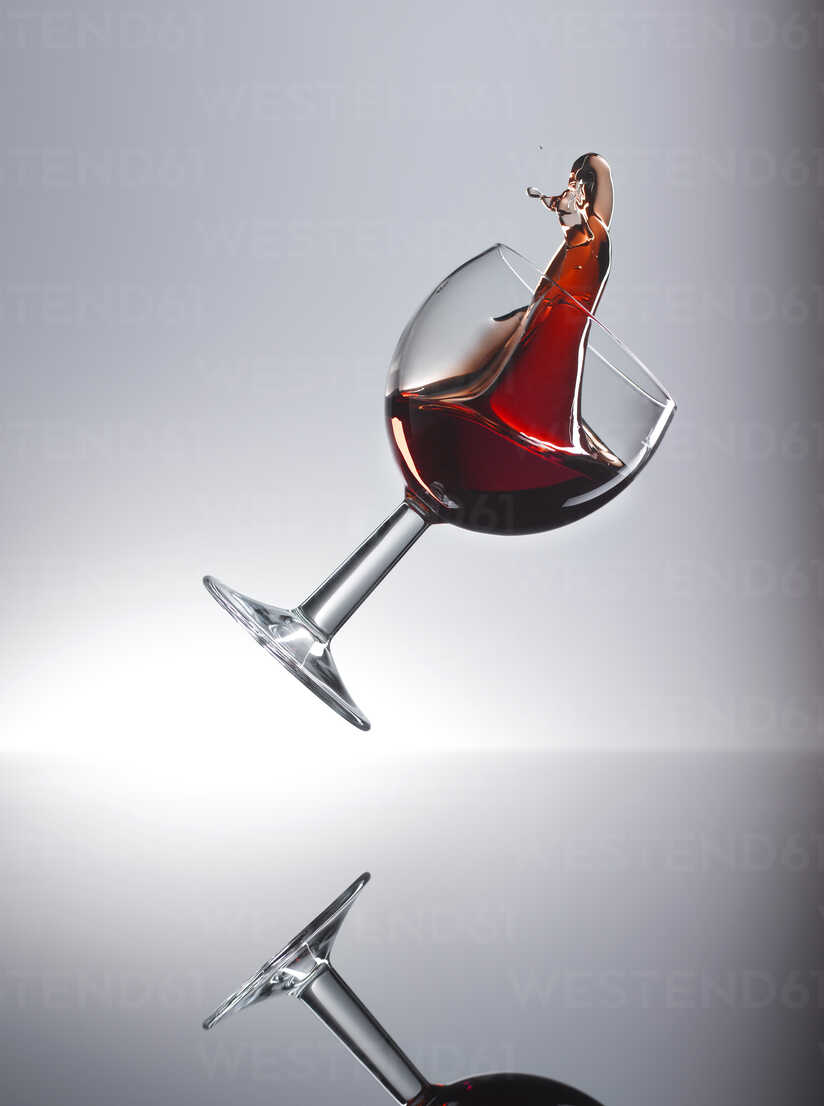 Red wine shaking in glass - KSWF001325 - Kai Schwabe/Westend61