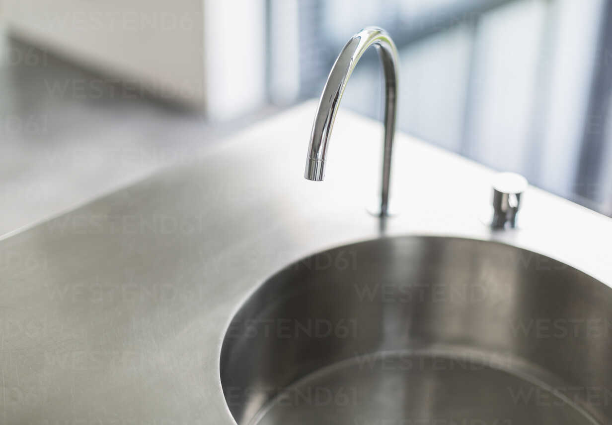 Modern Simple Stainless Steel Kitchen Sink And Faucet Stockphoto