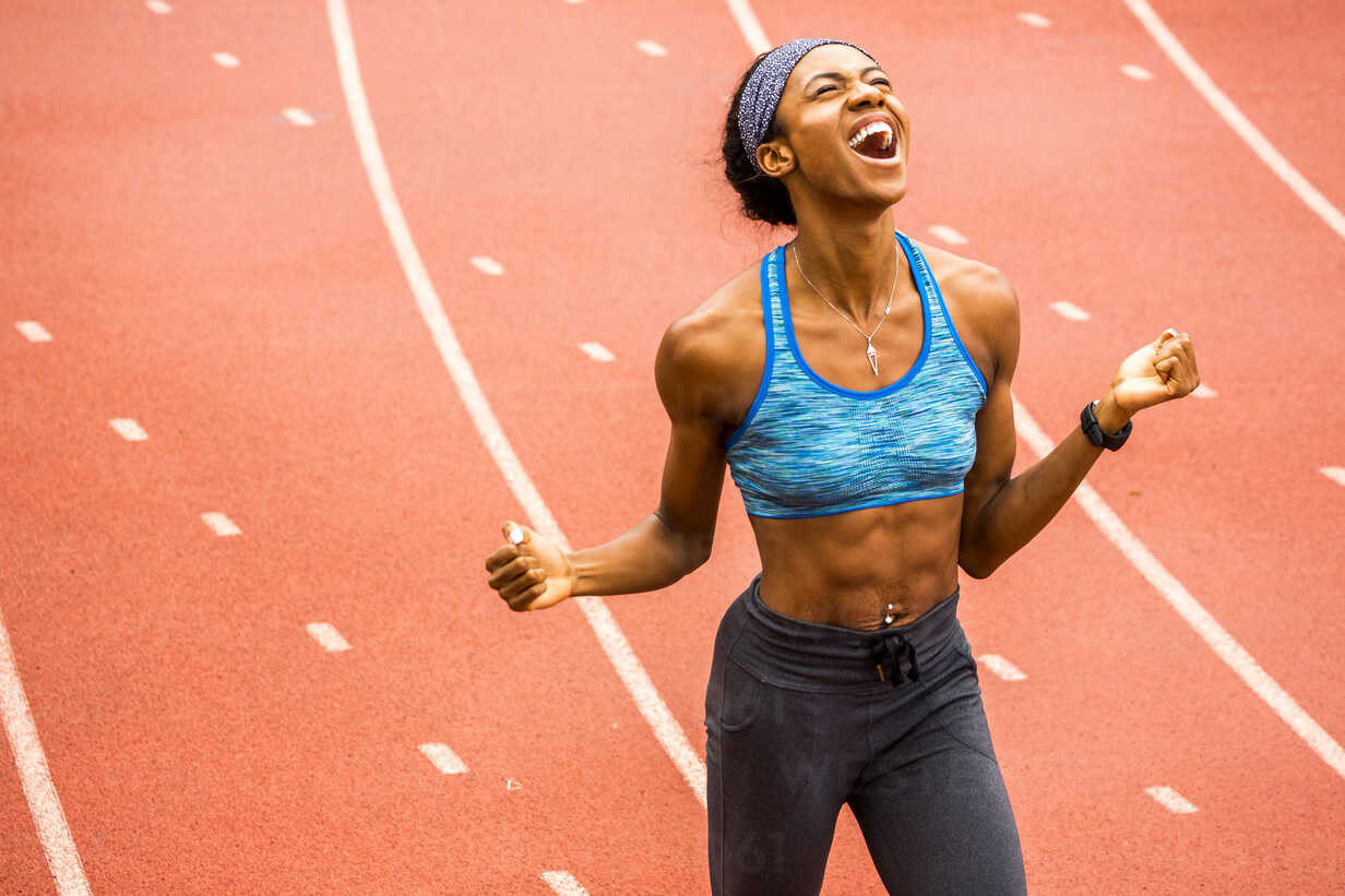 Happy Black athlete celebrating on track – Stockphoto. Copyright: Westend61 / Blend Images / Adam Hester