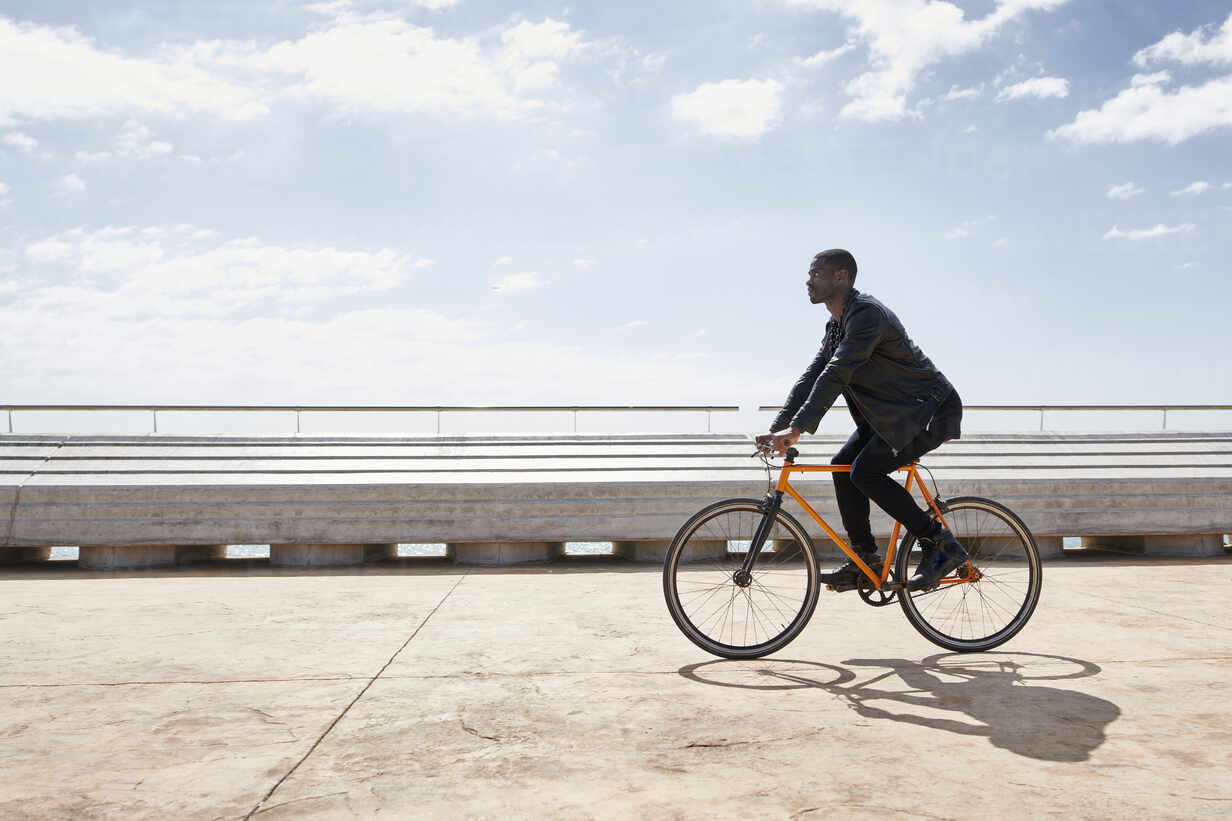 man riding bike