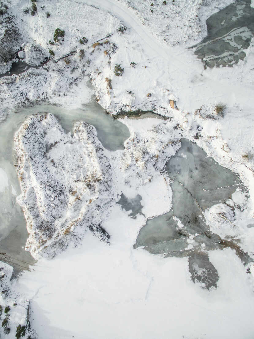 Aerial View Of Snowy Rocky Landscape In Countryside Of Estonia Stockphoto