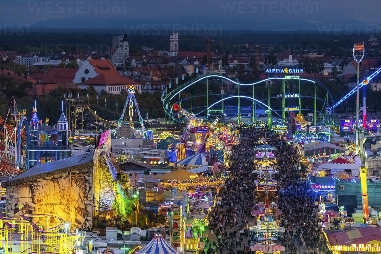 Germany Bavaria Munich Drone View Of Crowds Of People Celebrating Oktoberfest In Vast Amusement Park At