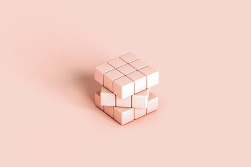 Studio Shot Of Pastel Colored Blank Puzzle Cube Stockphoto